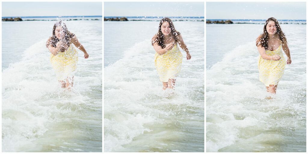 girl in yellow dress splashing water at photographer 