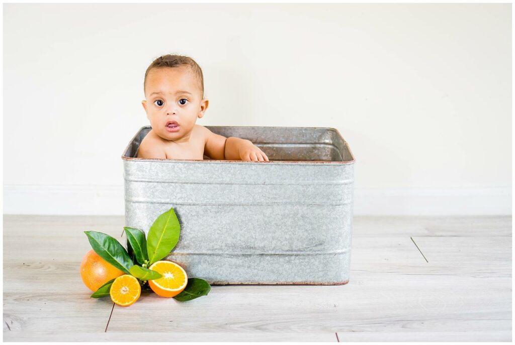 baby in grapefruit milk bath