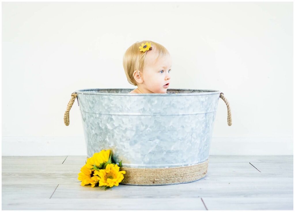 baby in sunflower milk bath