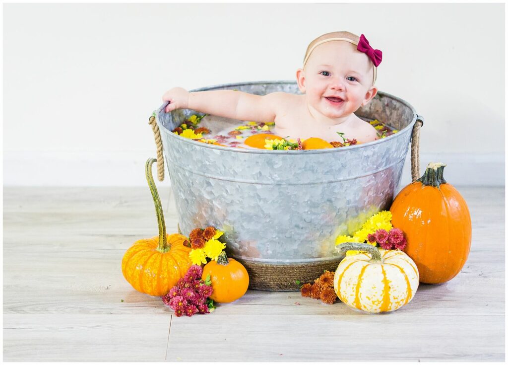 baby in pumpkin milk bath
