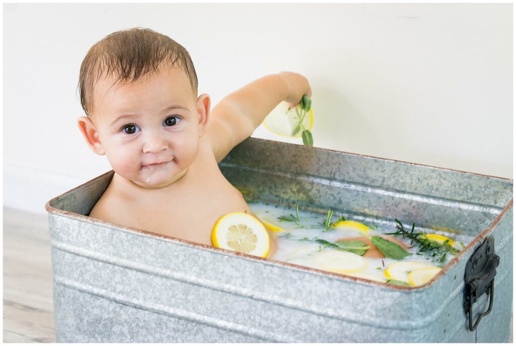 baby boy in lemon milk bath