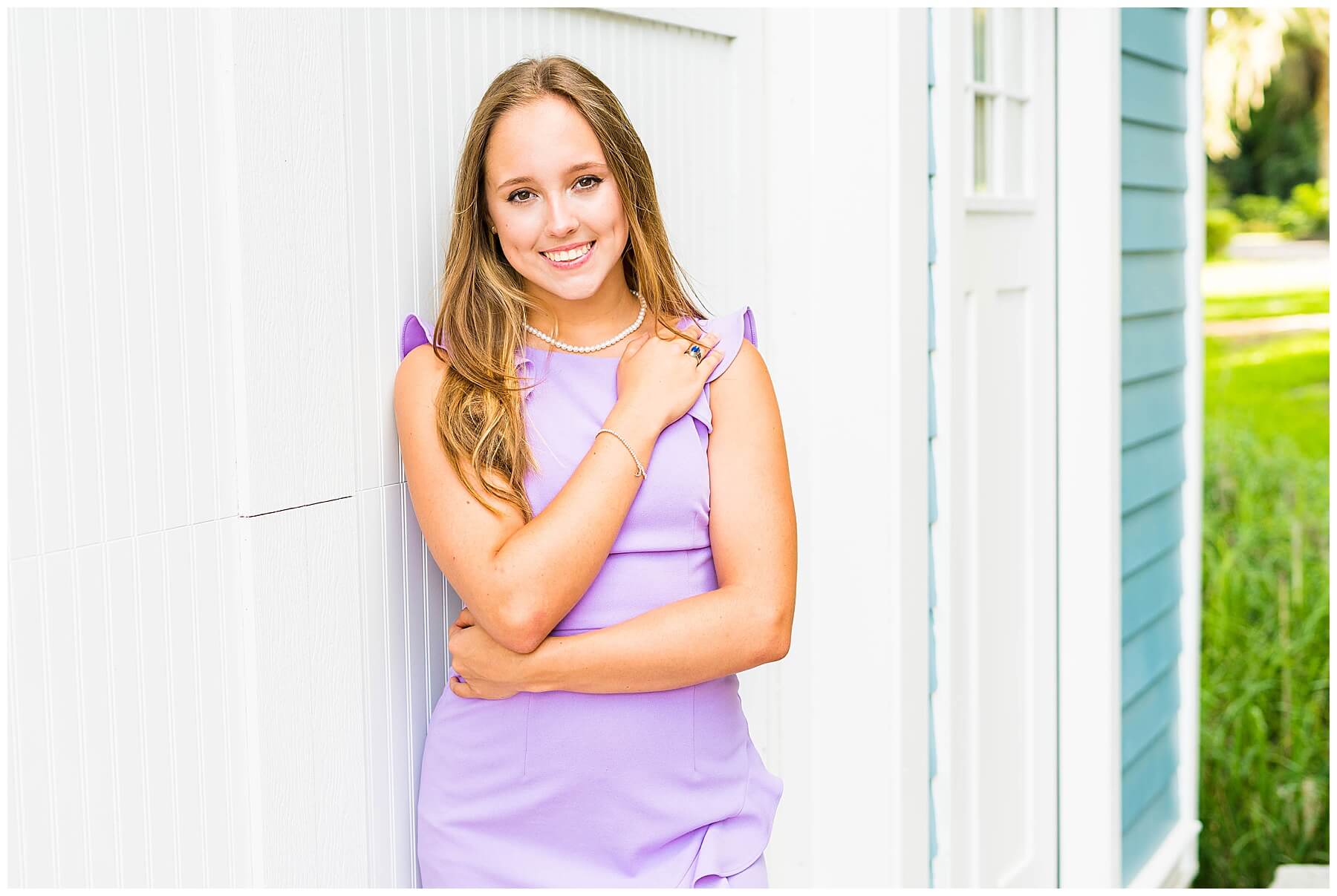 savannah senior girl posing in lavender dress in isle of hope Georgia