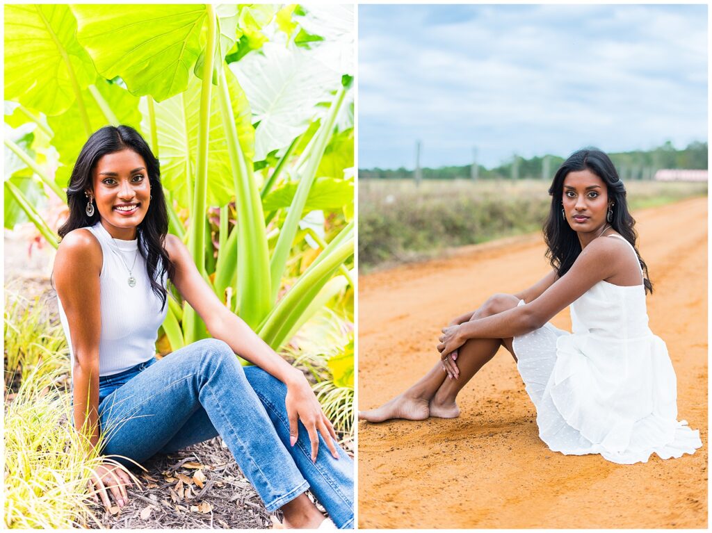 high school senior girl in jeans and tank top sitting in palm leaves and sitting on red dirt road in white dress