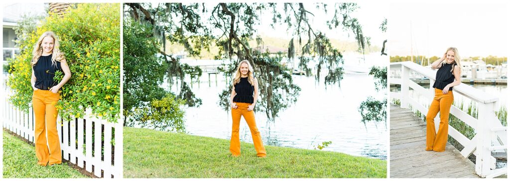 high school senior wearing gold pants and a black top on Isle of Hope's Bluff Drive