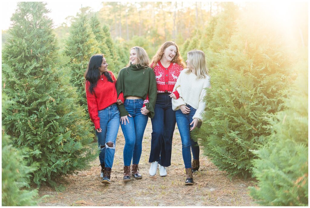 collage of high school senior girls standing in a a row of Christmas trees