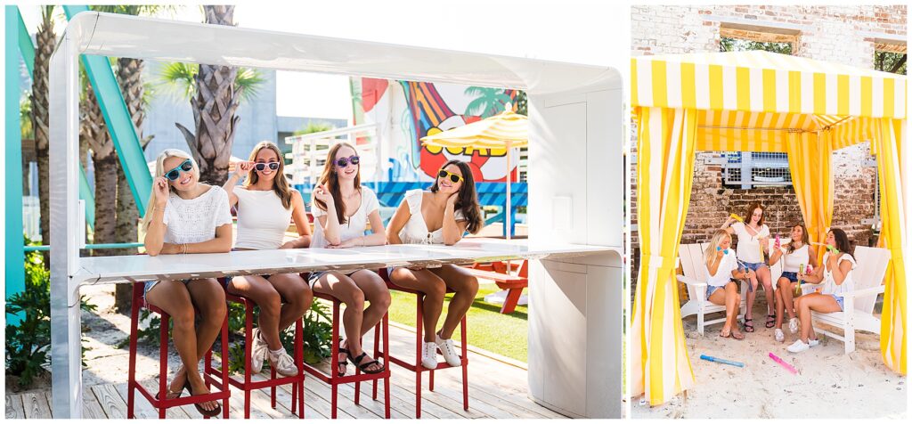 This image is a playful, summery collage featuring the same group of four young women: On the left, they are sitting side by side on tall red stools at a sleek white bar structure. Each one is wearing colorful sunglasses and smiling, with palm trees and a bright mural in the background, reinforcing the fun outdoor setting. On the right, the group is relaxing inside a yellow-and-white striped cabana. They are sitting on white wooden chairs in the sand, holding bubble wands and drinks, playfully blowing bubbles and laughing together. The overall mood is carefree, colorful, and summery, capturing the vibe of friends hanging out at a beach-inspired spot.